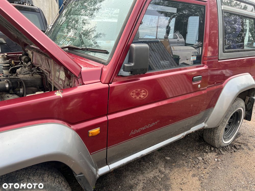 Foteliki tylne lewy prawy daihatsu Rocky fourtrak 2.8tdx - 7