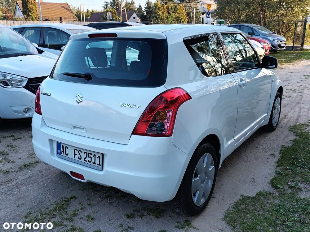 Suzuki Swift 1.3 Comfort+ - 14