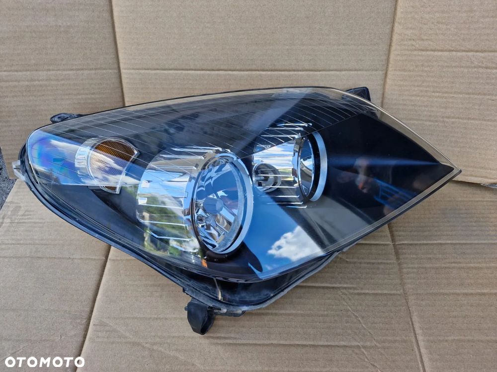 Lampa przednia prawa Opel Astra H III GTC CABRIO EUROPA - 1