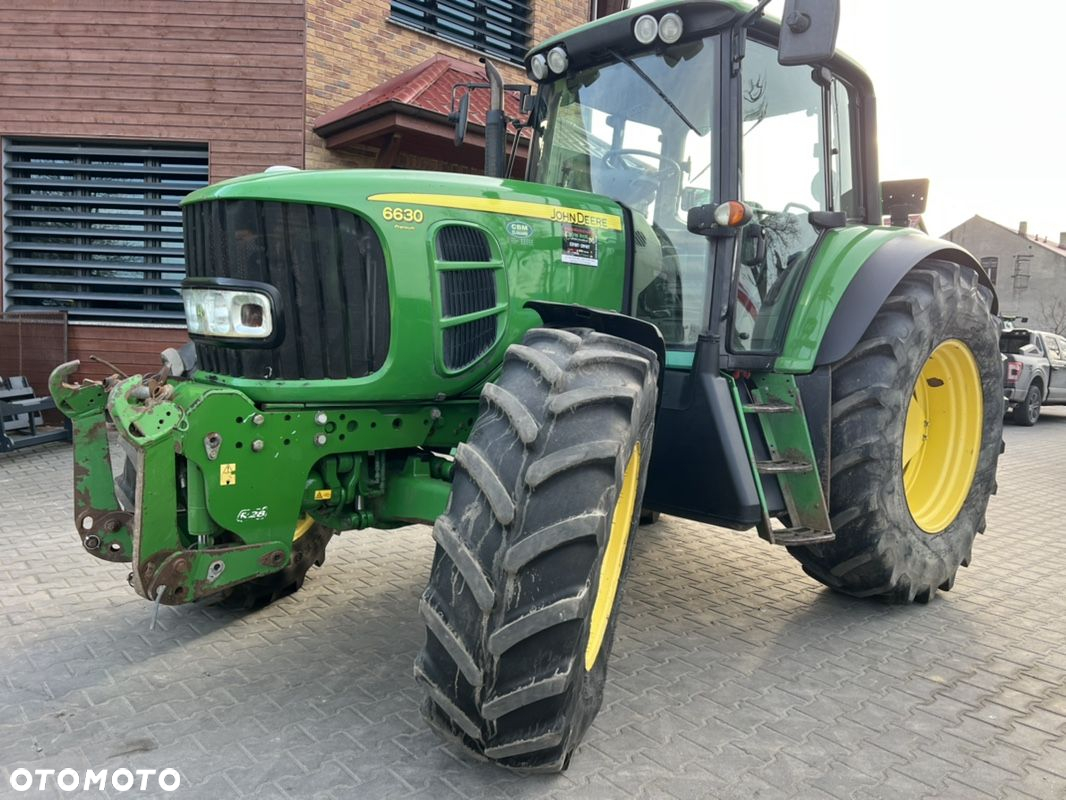 John Deere 6630 Premium 6830. new holland - 7