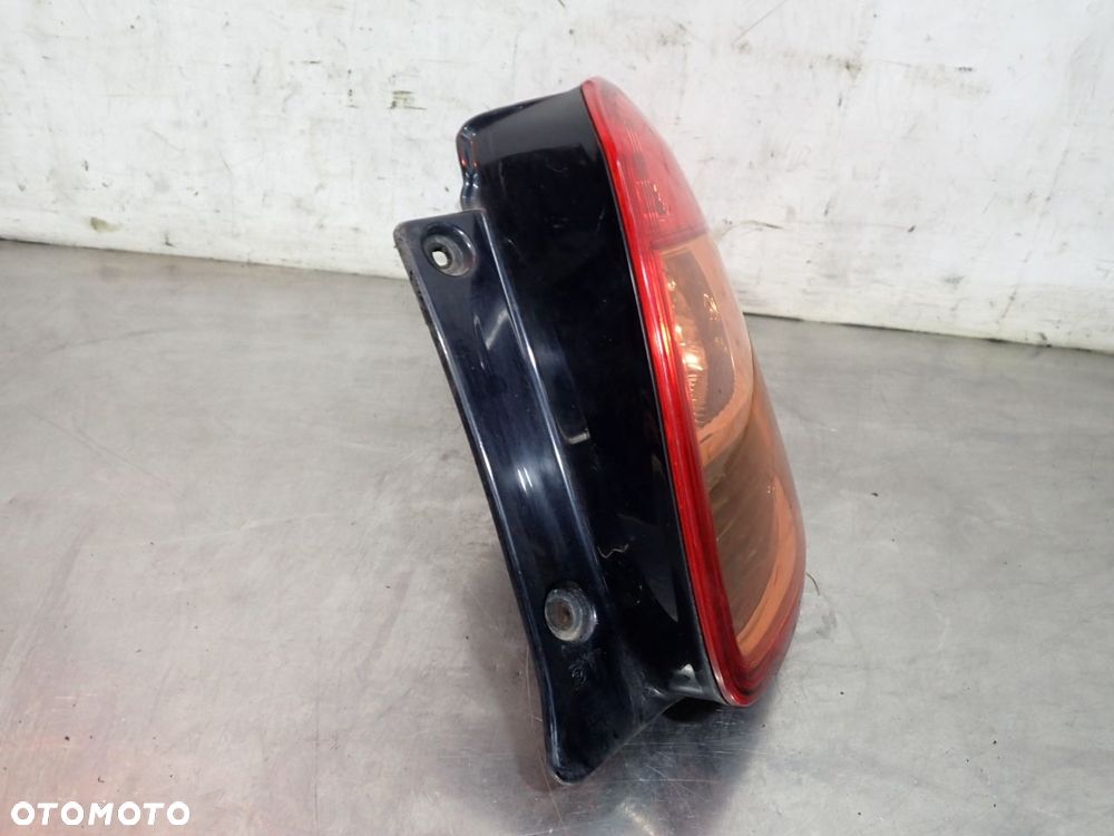 LAMPA PRAWA TYLNA SUZUKI SX4 1.6 - 6