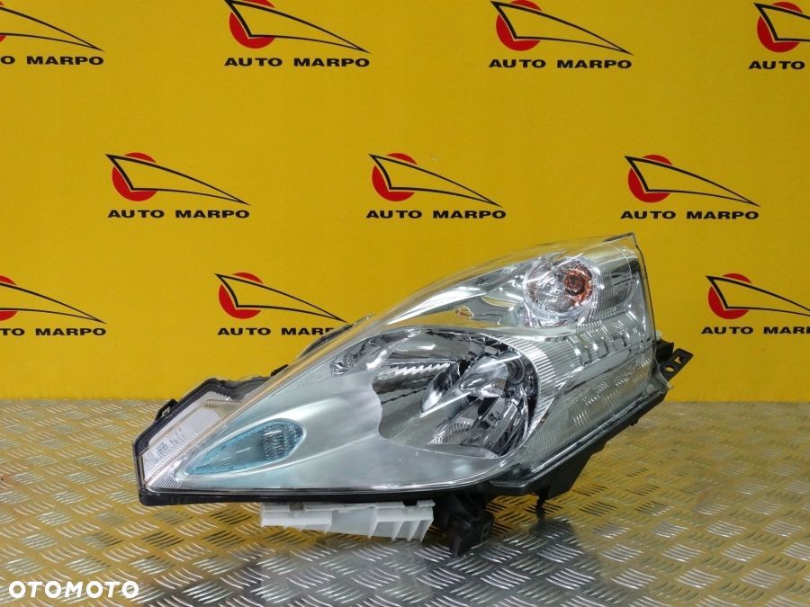 NISSAN LEAF 2010- REFLEKTOR LAMPA PRZÓD ZWYKŁA LEWA USA - 2