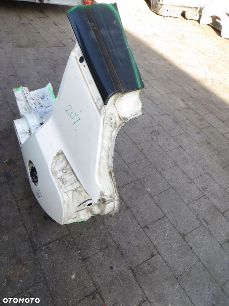 SSANGYONG TIVOLI BŁOTNIK ĆWIARTKA LEWY TYŁ 14- - 2