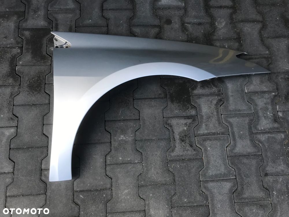 Renault Laguna III 07- Błotnik Lewy Przód TED69