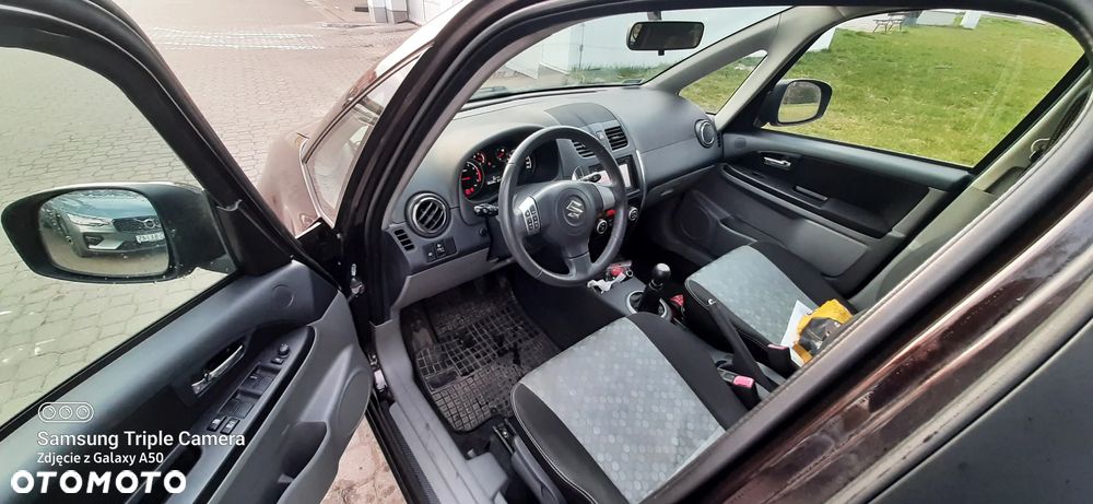 Suzuki SX4 1.6 Comfort Plus - 13