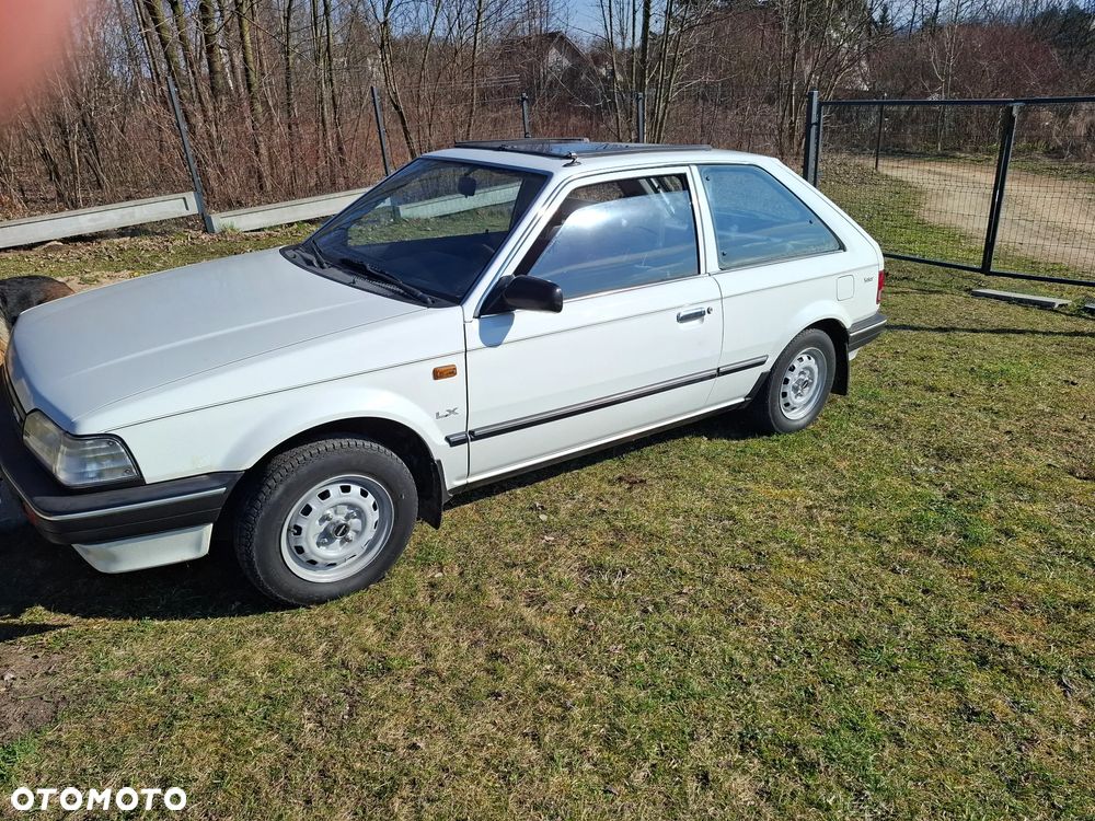 Mazda 323 1.3 LX - 19