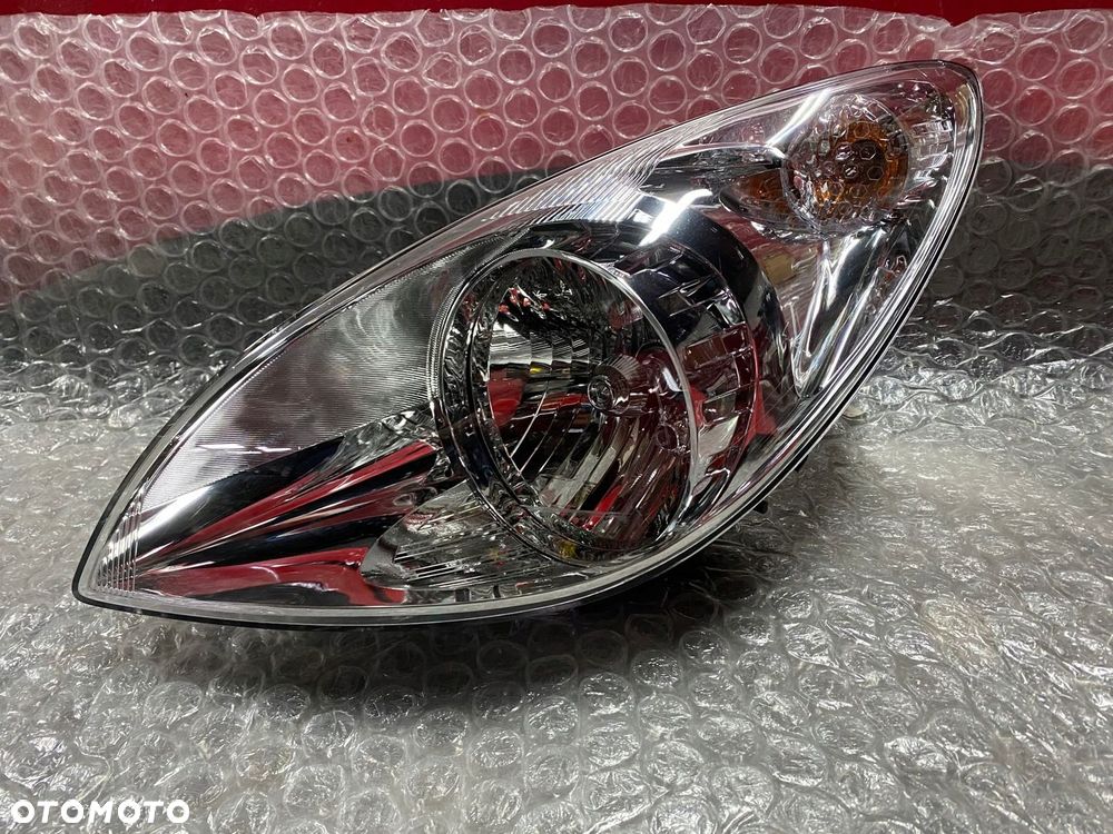 LAMPA LEWA ZWYKŁA HYUNDAI I10 I 92101-1J0XX - 1