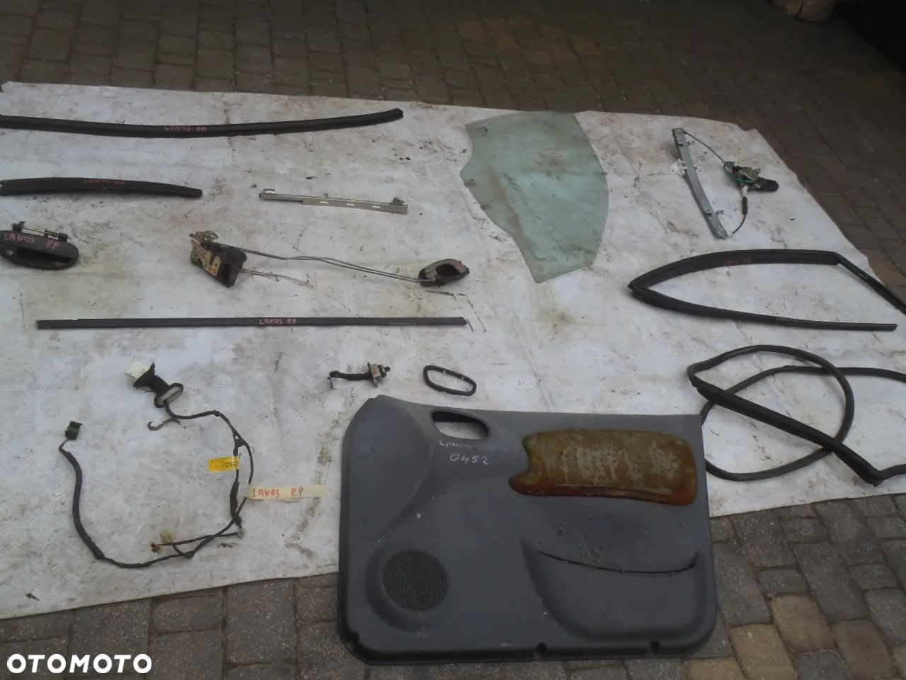 szyba uszczelka listwa klamka zamek silniczek mechanizm drzwi karoseryjna daewoo lanos - 1