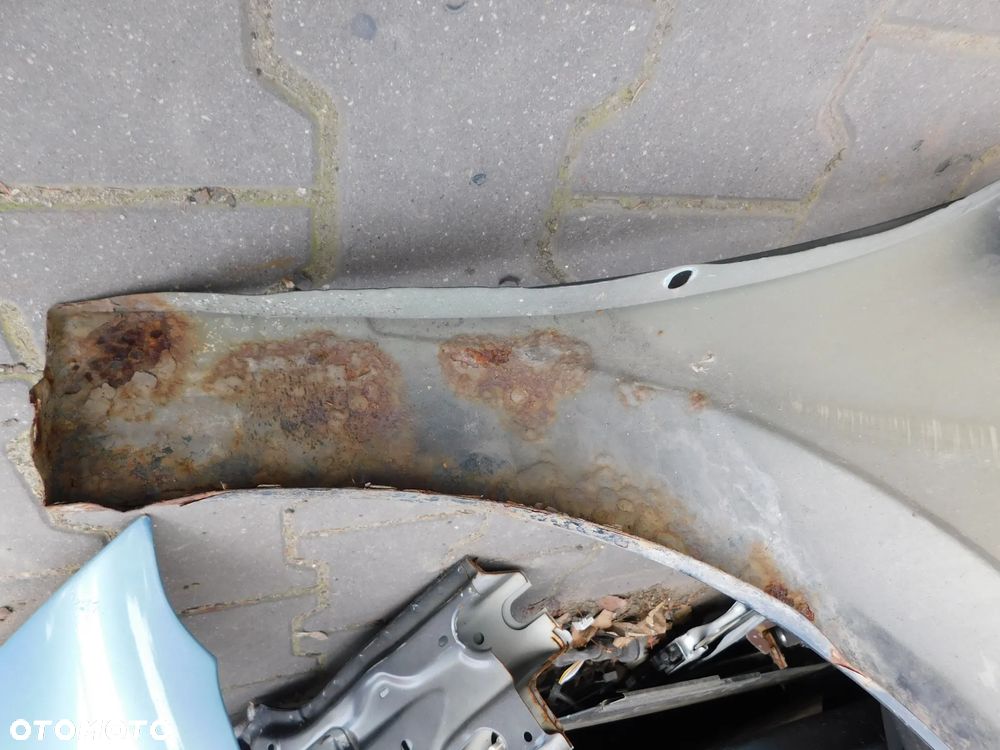 błotnik lewy przód OPEL ASTRA III H z20r - 14