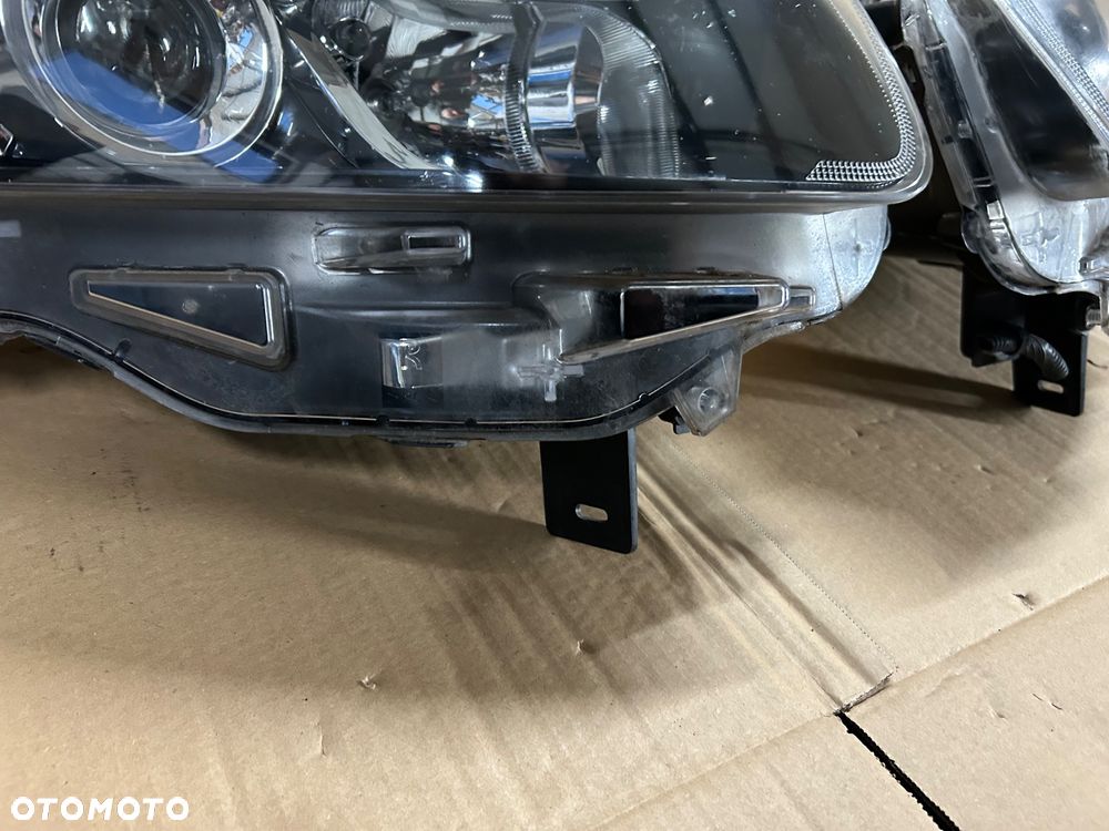 Renault Koleos I lift 2011- lampa lewy przód prawy przód europa soczewka - 10