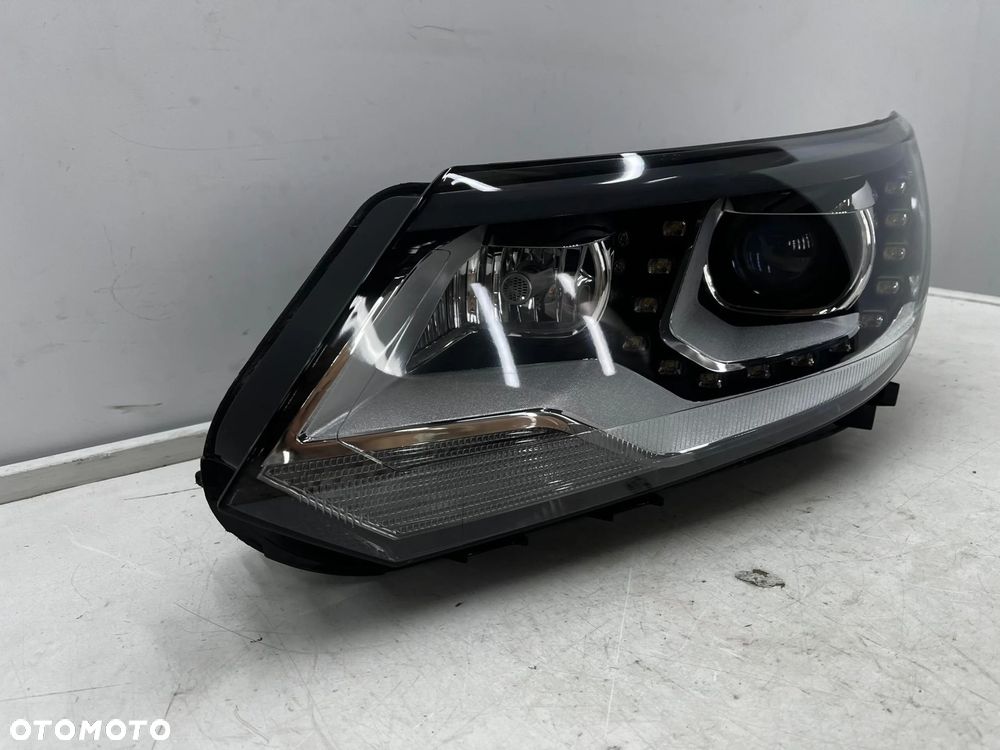 Lampa reflektor VW Tiguan 1 I 5n LIFT 10-16r. lewa przednia XENON EU skrętna doświetlanie zakrętów + - 2