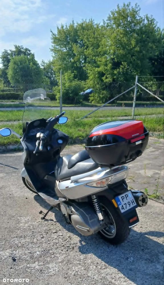 Kymco Xciting - 6