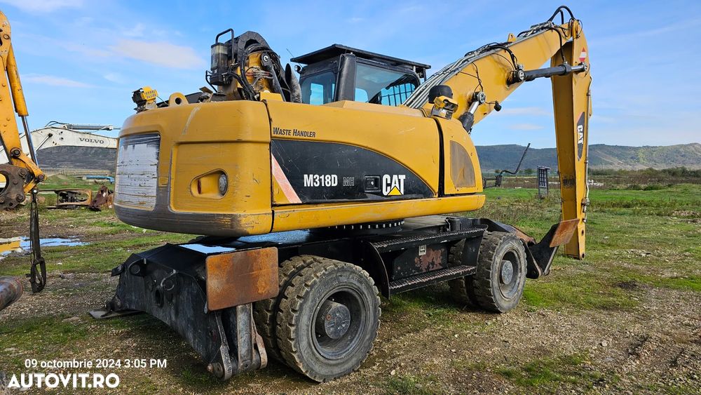 Caterpillar CAT 318 D Excavator pe roti - 3