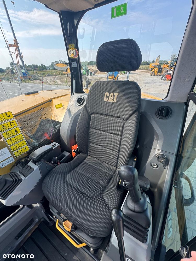 Caterpillar 310 - 25