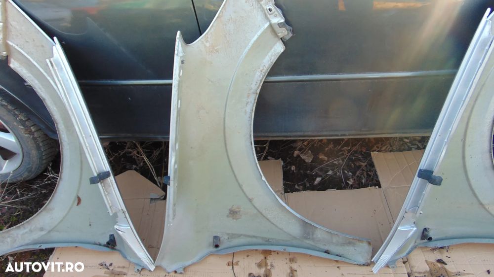 Aripa stanga/dreapta Opel Astra H an 2007 - 9