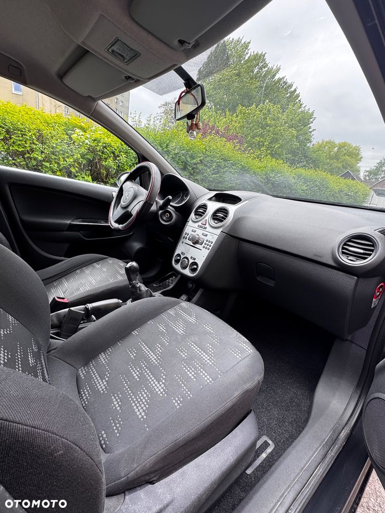 Opel Corsa 1.4 16V Enjoy - 9