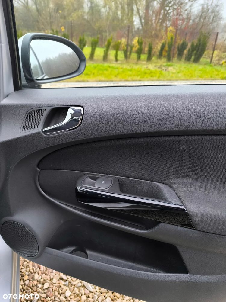Opel Corsa 1.4 16V Enjoy - 22