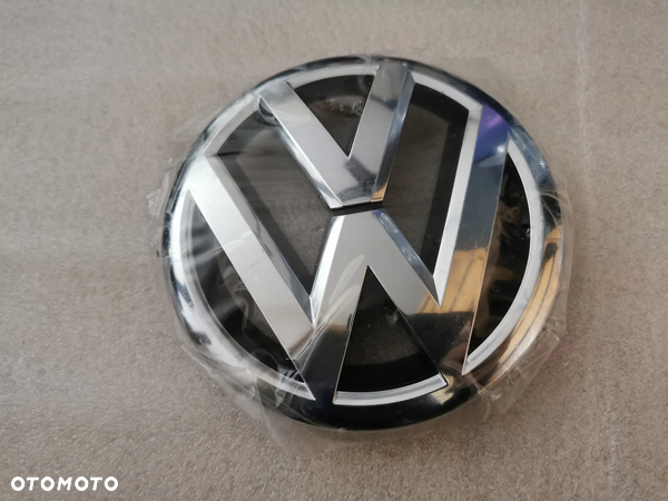 VW Tiguan lift Passat b7 CC Emblemat grilla logo znaczek przód NOWY 561853600