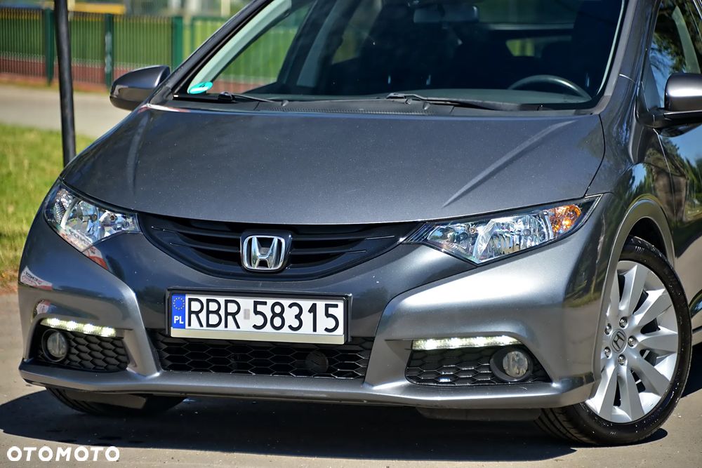 Honda Civic 1.4 i-VTEC - 11