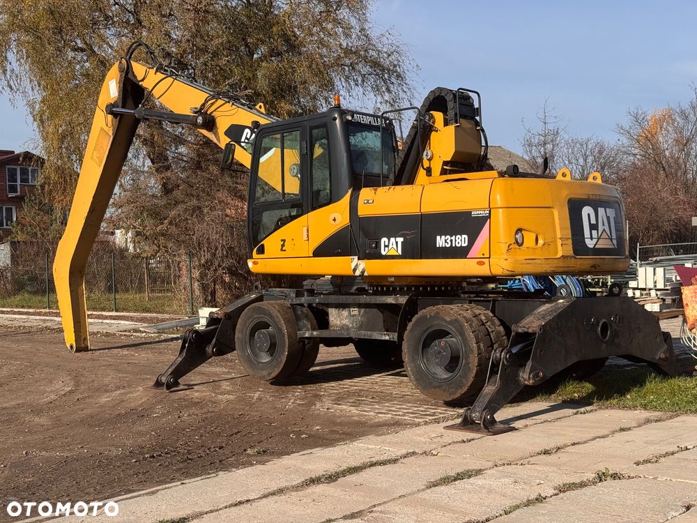 Caterpillar M318D - 1