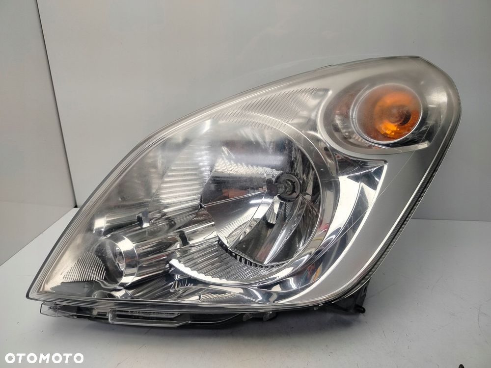 SUZUKI SPLASH 08R- REFLEKTOR LAMPA LEWY PRZÓD LEWA PRZEDNIA - 1