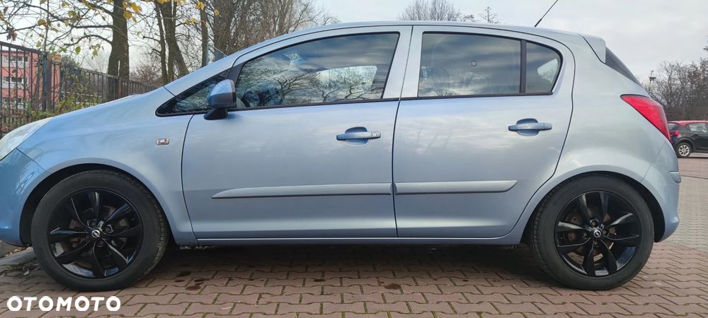 Opel Corsa 1.4 16V Cosmo - 11