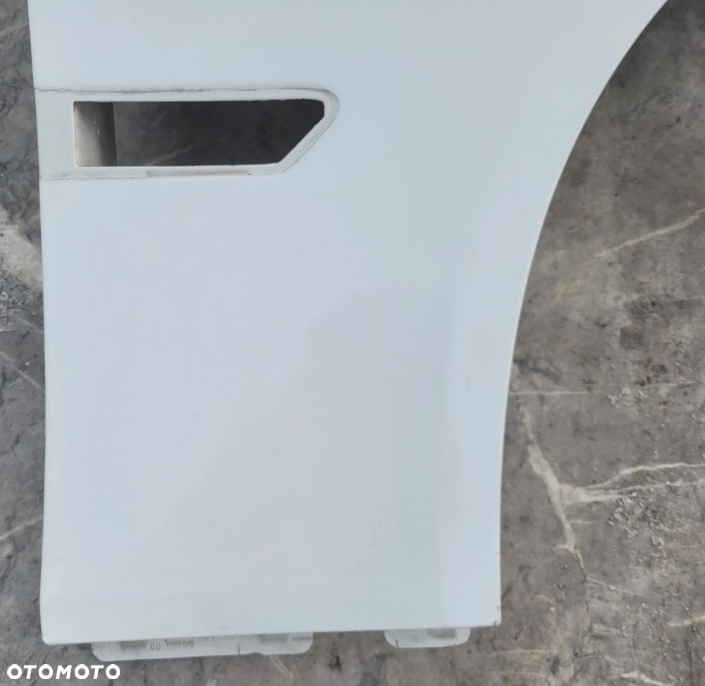 BŁOTNIK PRAWY PRZÓD PRZEDNI BMW F01 F02 F04 A96 MINERALWHITE B353