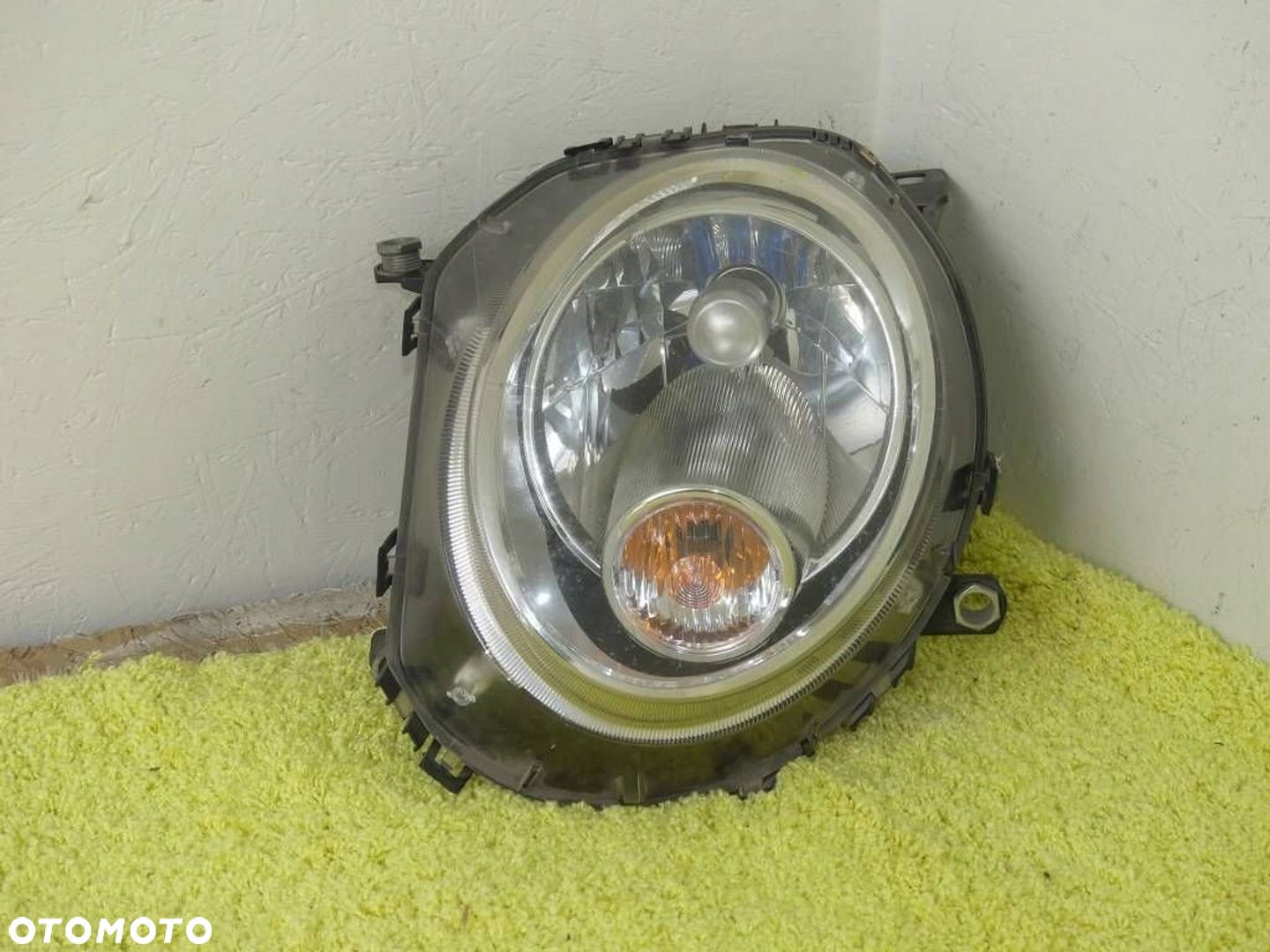 Lampa Przód Lewa TYC - MINI R55 R56 06-13r IGŁA EUROPA - 1
