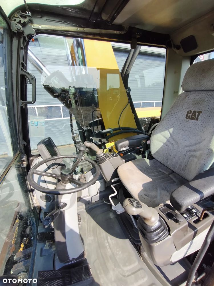 Caterpillar M318D - 11