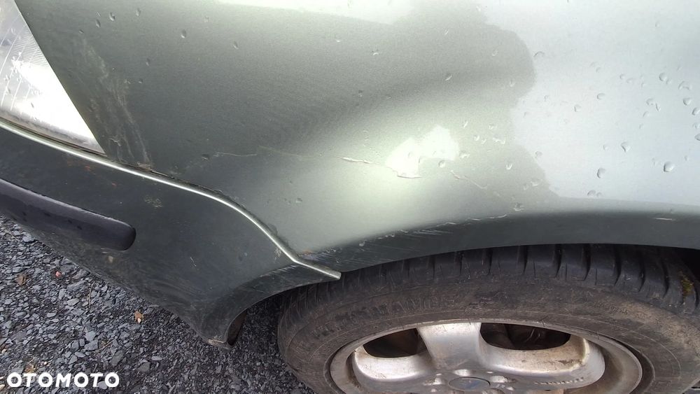 VW PASSAT B5 LIFT FL BŁOTNIK LEWY PRZEDNI PRZÓD LA6W nr. 52/3 - 2