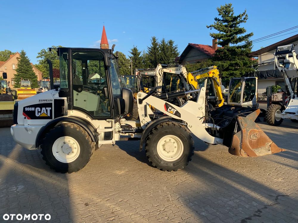Caterpillar CAT 908M, 2020 ROK, 3500 MTH, ŁYŻKA OTWIERANA + WIDŁY, z NIEMIEC, - 3