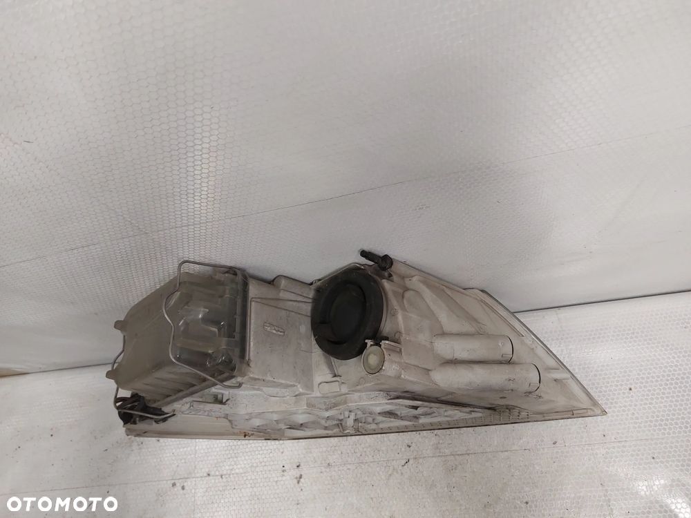 .  LAMPA PRZOD PRZEDNIA LEWA SKODA OCTAVIA 2 - 5