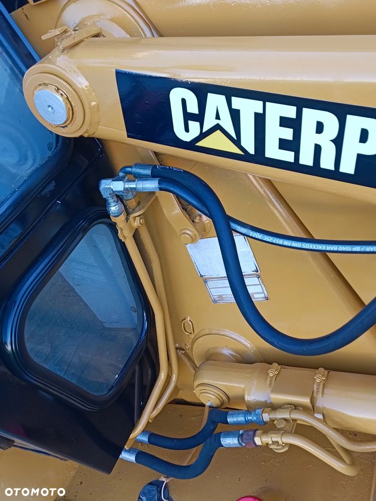 Caterpillar 428 B - 13