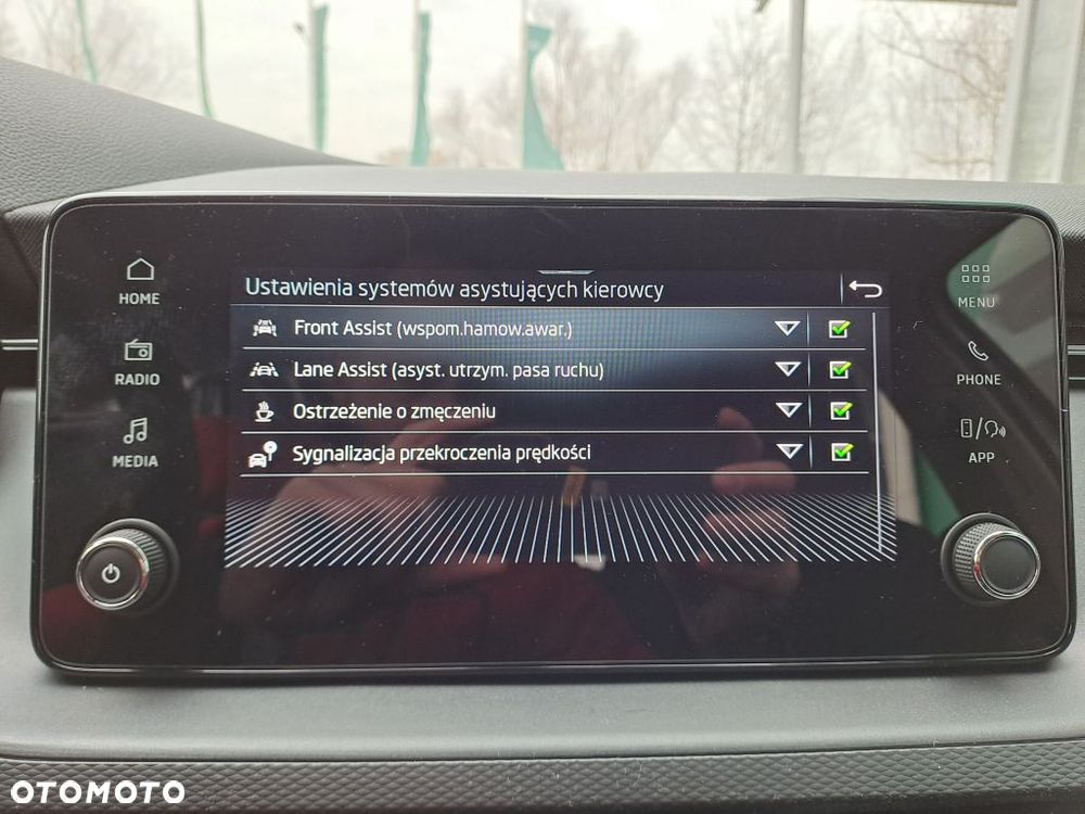 Skoda Kamiq 1.0 TSI Essence - 11