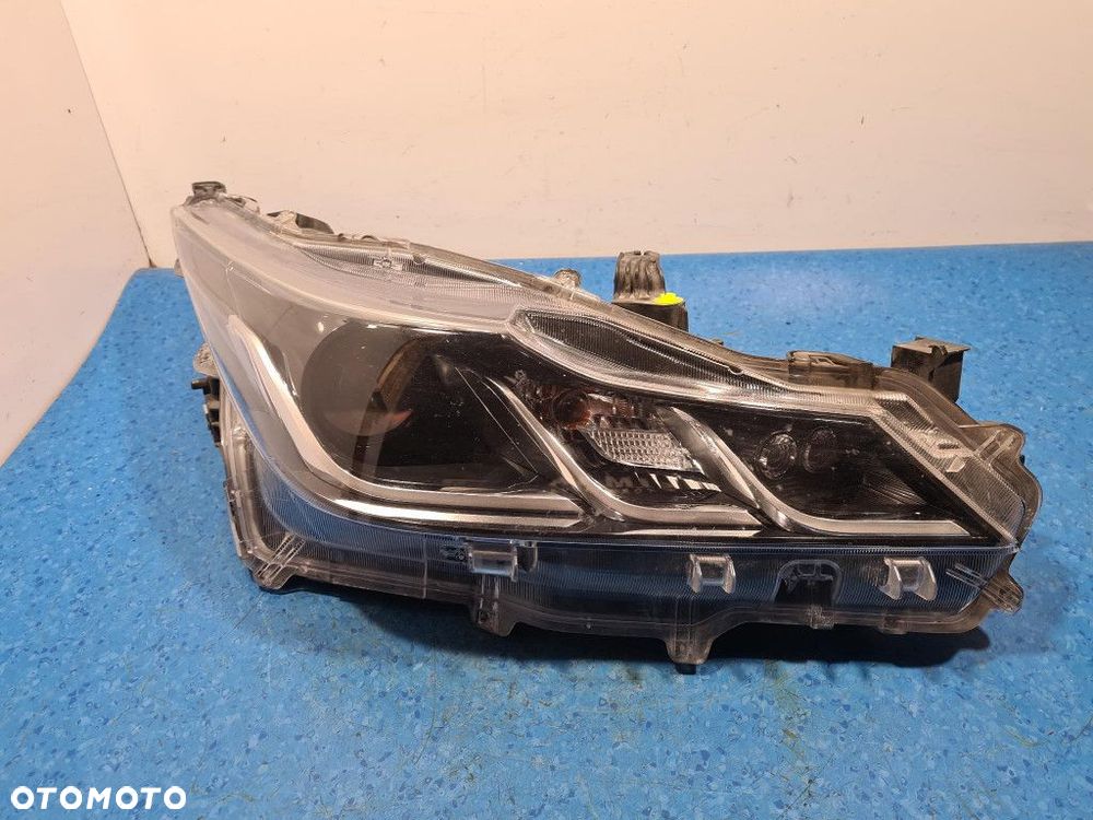 TOYOTA COROLLA E21 REFLEKTOR PRAWY 81110-02T30-00 - 9
