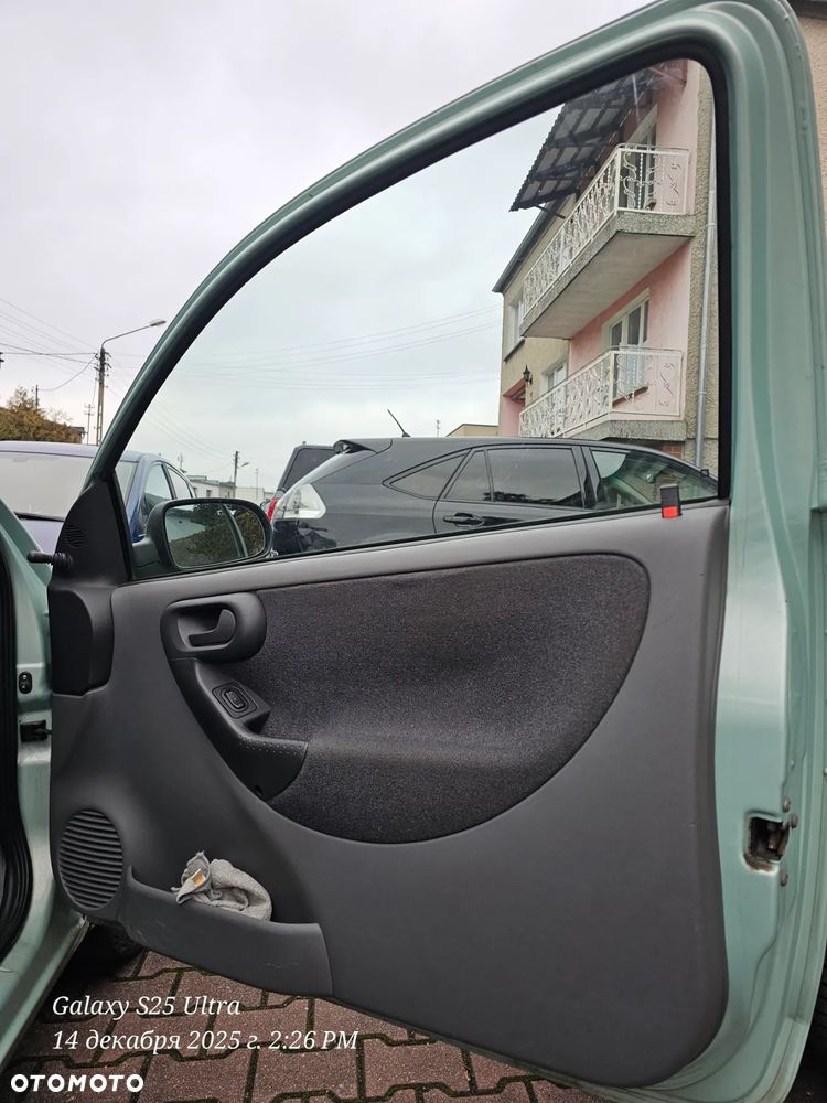 Opel Corsa 1.2 16V Comfort Easytronic - 9