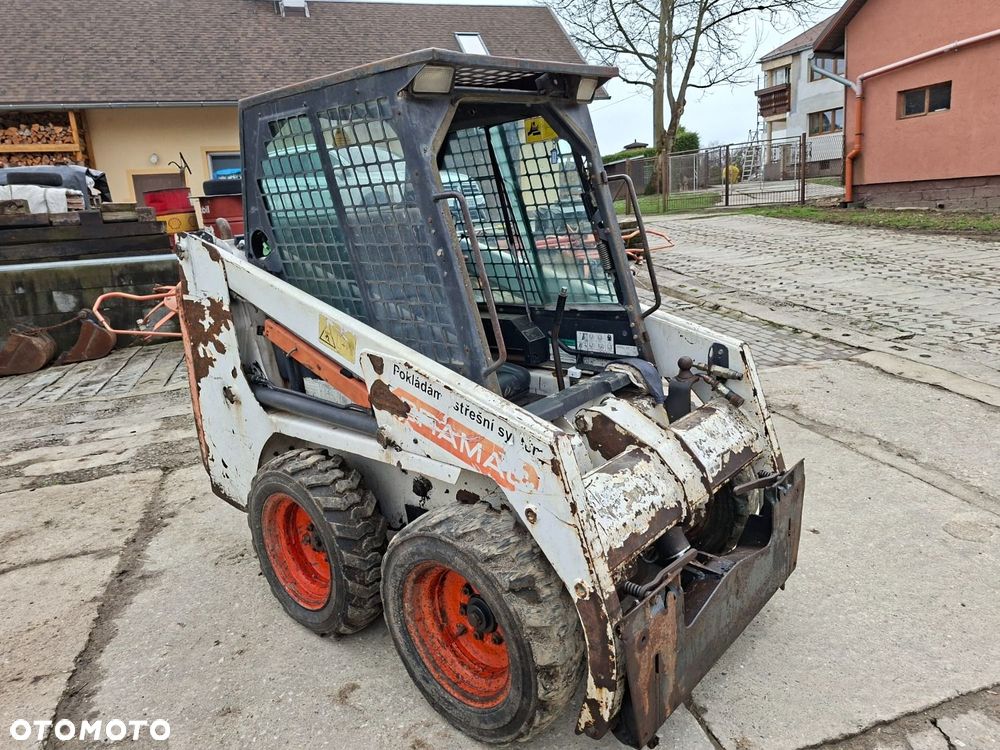 Bobcat 553 4X4 + Melroe Ingersoll-Rand 725S B/H - 3