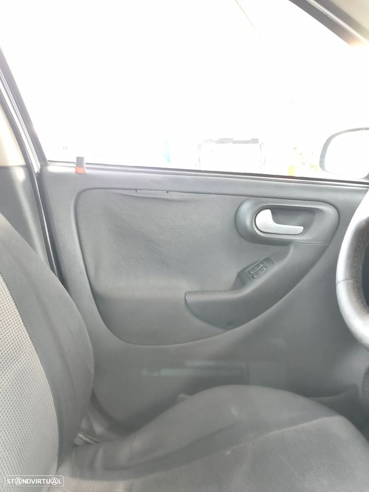 Opel Corsa 1.2 16V Enjoy - 12