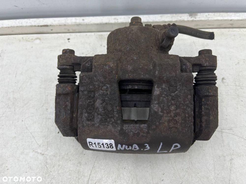 Zacisk hamulcowy Chevrolet Nubira III J200 05-12r. 2.0 cdi diesel lewy przedni jarzmo lewy przód - 2