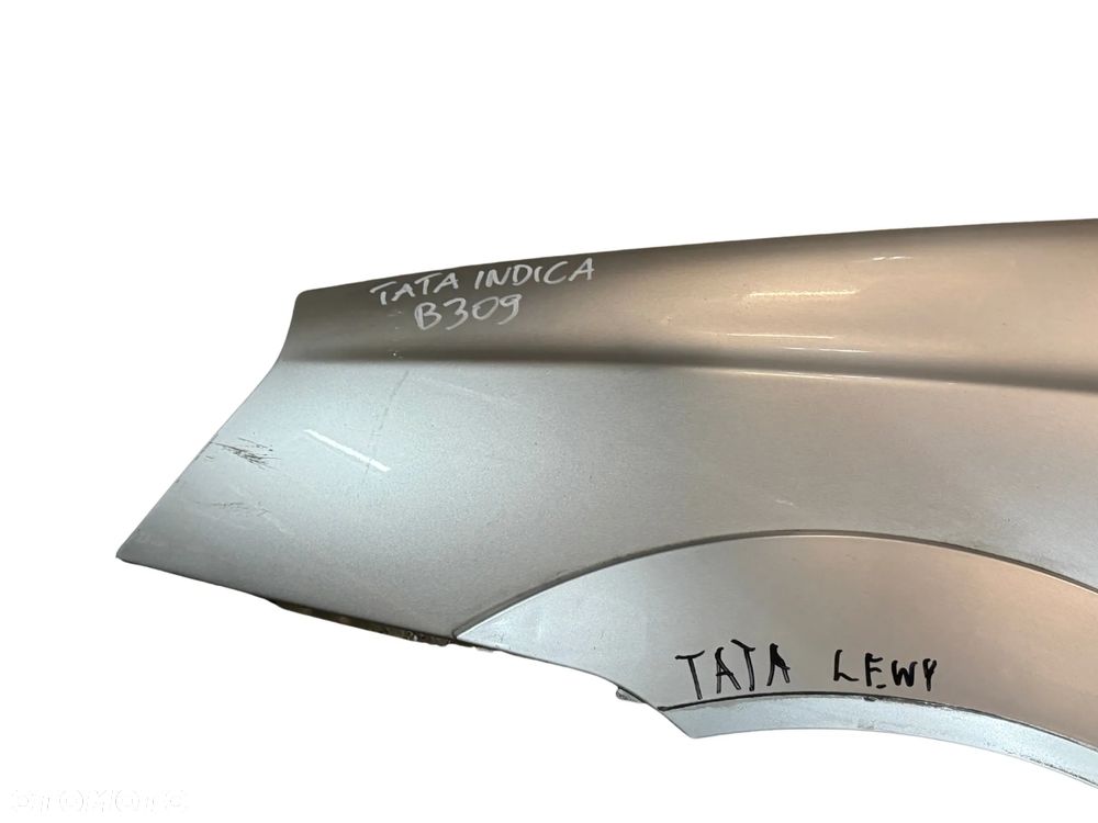 BŁOTNIK LEWY TATA INDICA SREBRNY ORYGINAŁ - 2