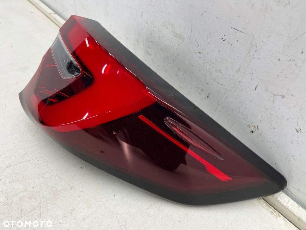 Lampa Toyota Corolla XII E21 kombi LIFT 22r.- PRAWA tylna w błotnik oryginalna Europa - 6