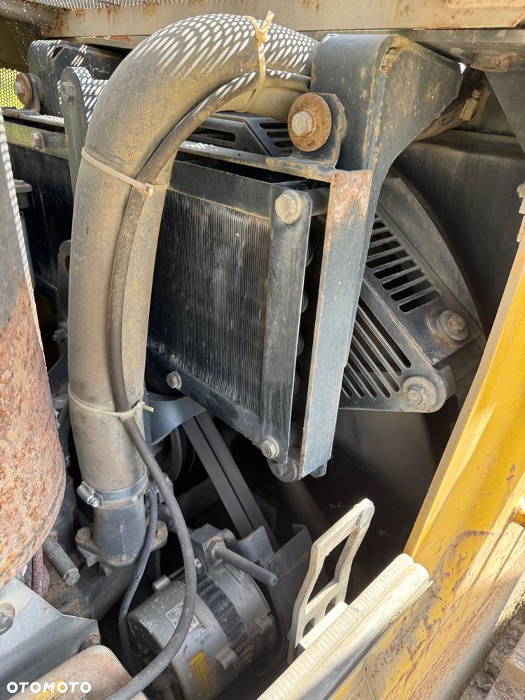Komatsu DX65PX-12 - 24