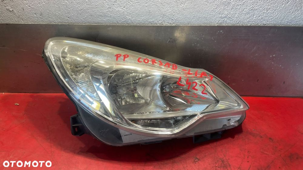 REFLEKTOR LAMPA PRAWY OPEL CORSA D LIFT ORYGINAŁ EUROPA - 1