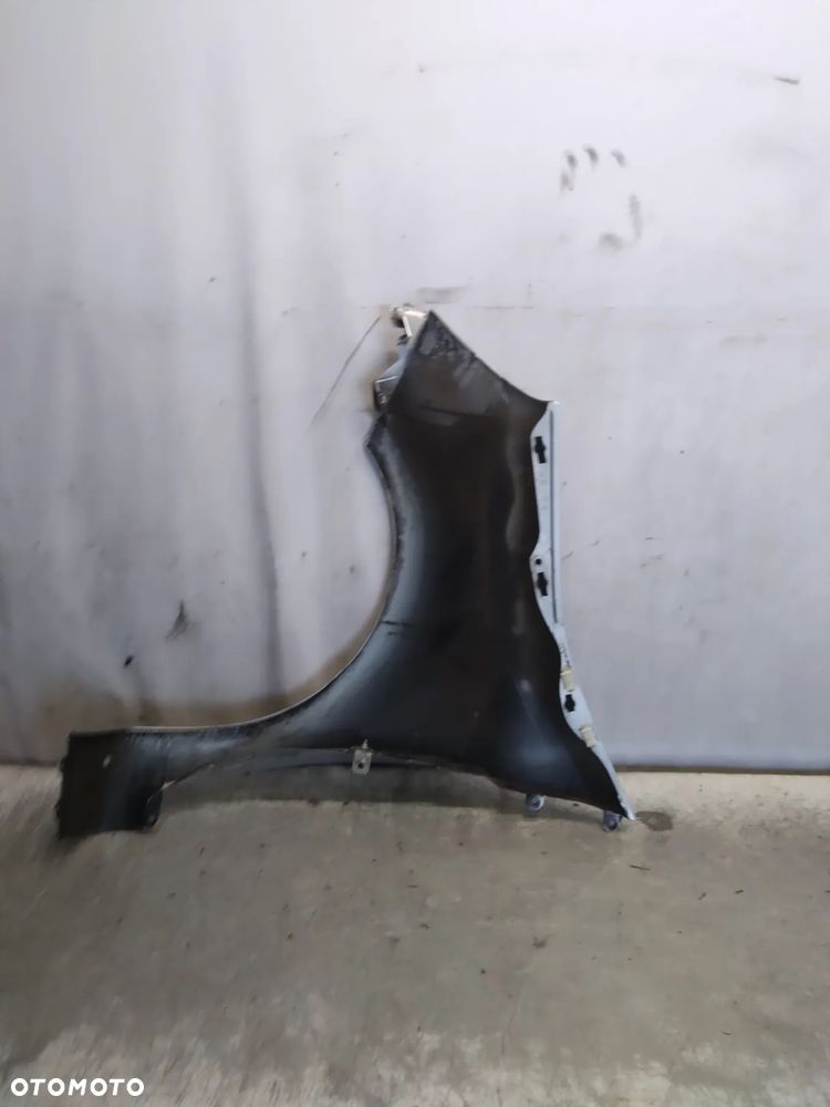 RENAULT MODUS BŁOTNIK PRZEDNI PRAWY TED69 SREBRNY - 4
