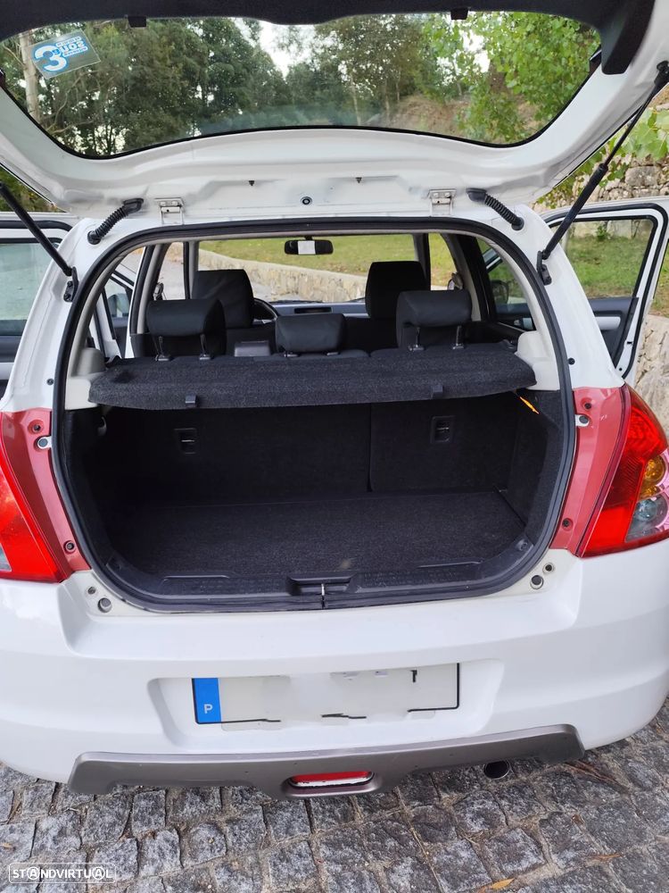 Suzuki Swift 1.3 DDiS Quiksilver - 11
