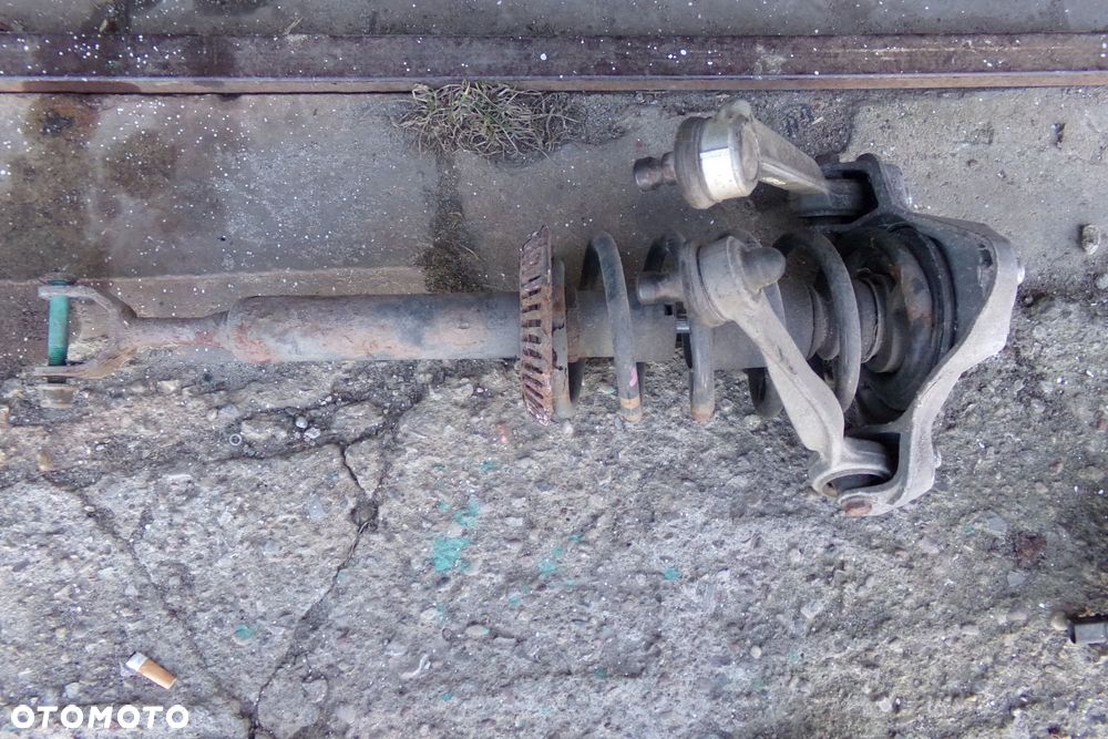 Mcpherson lewy amortyzator sprężyna Audi A4 VW Passat Seat Exeo