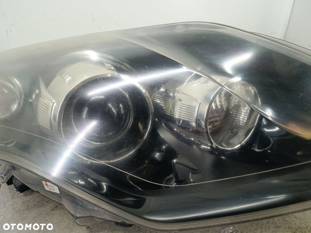 LAMPA PRZÓD PRAWA XENON RENAULT LAGUNA III 260100043R 89902279 89034934 - 4