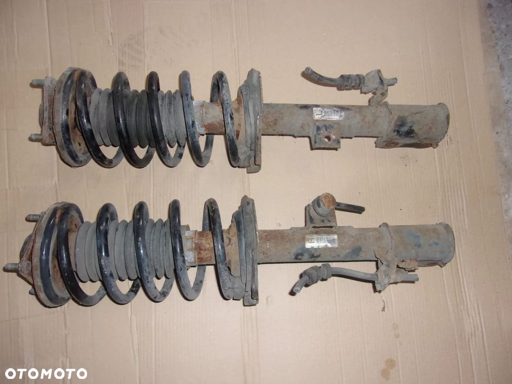 FORD MAVERICK MAZDA TRIBUTE MCPERSON  AMORTYZATOR SPREZYNA LEWY PRAWY