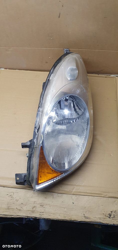 Lampa lewy przód przednia lewa Nissan Note E11 EU 26060-9U10A - 2