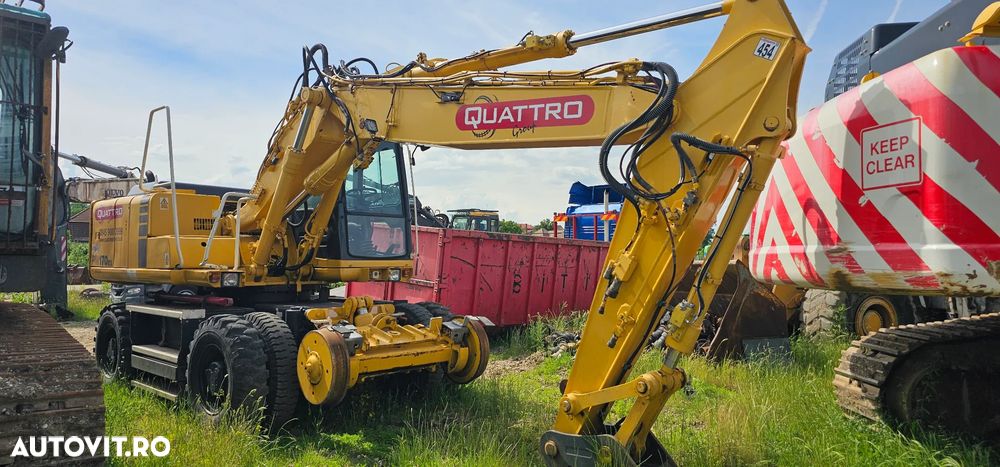 Komatsu PW 170 ES Excavator pe roți , cale ferata - 2